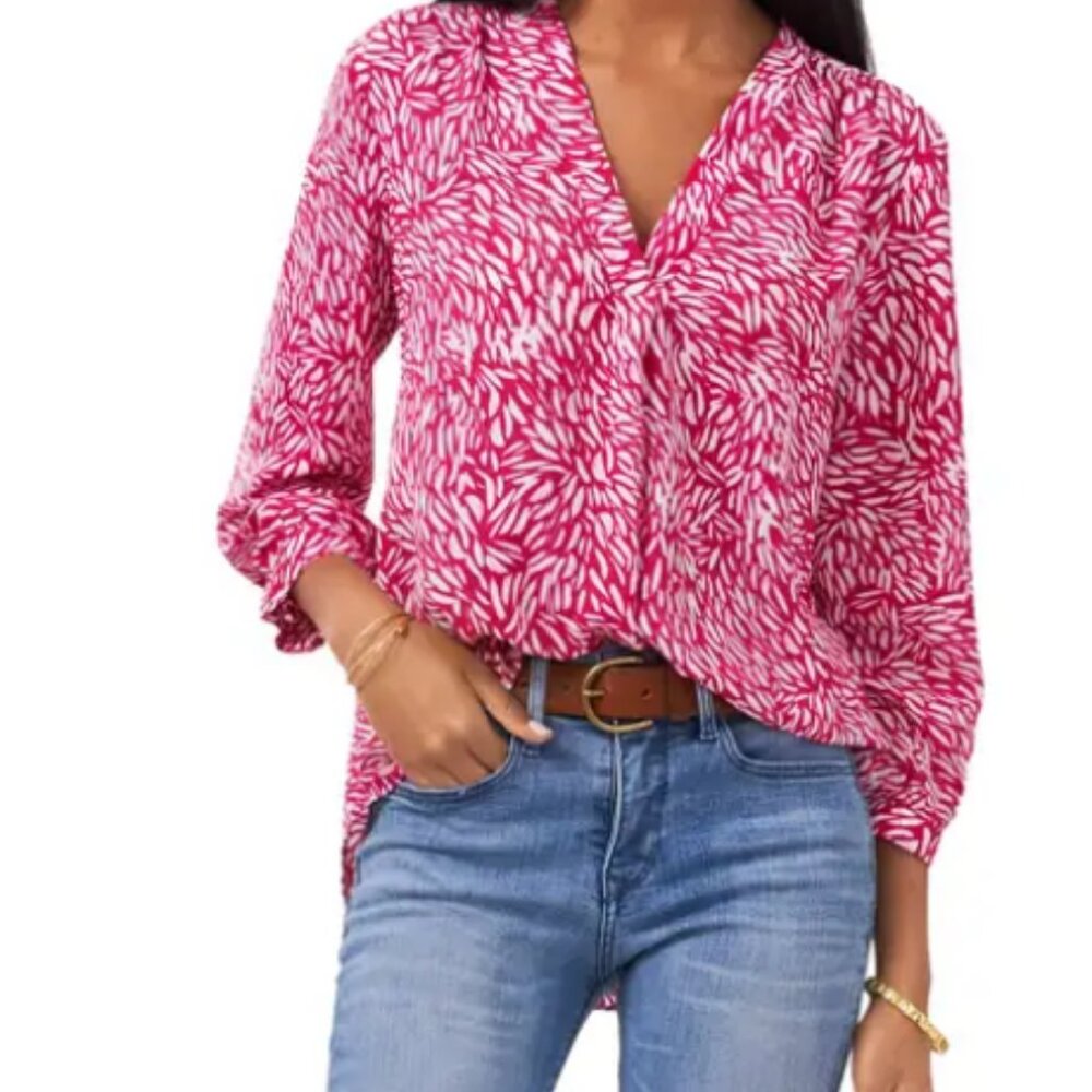 Versatile and stylish blouse easily transitions from work to play.